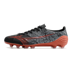 Scarpa da calcio Mizuno Alpha FG nera e rossa per terreni compatti