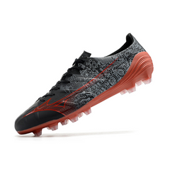 Scarpa da calcio Mizuno Alpha FG nera e rossa per terreni compatti