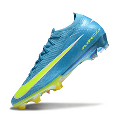 Botas de fútbol Nike Air Zoom Mercurial Vapor 16 Elite azul claro y amarillo para terreno firme (FG).