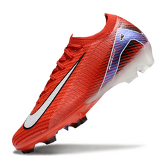 Botas de fútbol Nike Air Zoom Mercurial Vapor 16 Elite rojas y negras para terreno firme (FG).