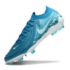 Botas de fútbol Nike Phantom GX2 Elite azul claro para terreno firme FG