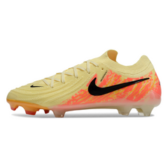 Botas de fútbol Nike Phantom GX2 Elite amarillas y naranjas para terreno firme (FG).