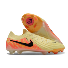 Botas de fútbol Nike Phantom GX2 Elite amarillas y naranjas para terreno firme (FG).