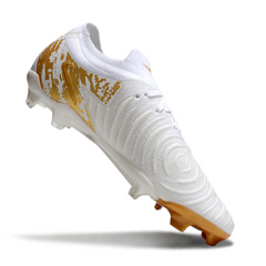 Scarpa da calcio Nike Phantom GX2 Elite bianca e oro per terreni compatti FG