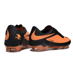 Botas de fútbol Nike Phantom Hypervenom Elite naranja y negro para terreno firme (FG).