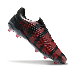 Scarpa da calcio Puma King Ultimate nera e rossa per terreni compatti FG