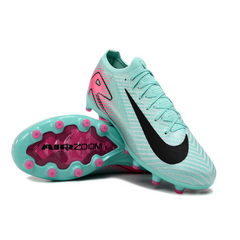 Botas de fútbol Nike Air Zoom Mercurial Vapor 16 Elite para niños, para césped artificial, color azul y rosa.