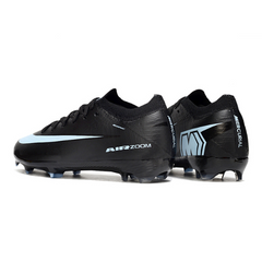 Botas de fútbol Nike Air Zoom Mercurial Vapor 16 Elite negras y azul claro para niños, para terreno firme (FG).