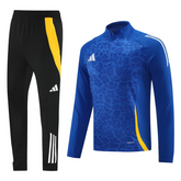 Adidas Cold Set blu, giallo e nero, top e pantaloni Cold Set con cerniera a un quarto