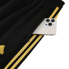 Giacca e pantaloni Adidas Cold Set neri e gialli