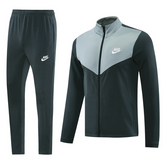 Conjunto de chaqueta y pantalón Nike Cold Set en verde y gris