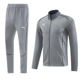 Chaqueta y pantalones Puma Cold Set grises