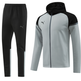 Conjunto de chaqueta y pantalón Puma Cold Set en gris y negro
