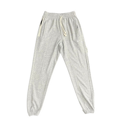 Pantalones deportivos Nike grises y blancos
