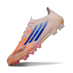 Botas de fútbol Adidas F50 Elite naranja y azul para terreno firme (FG).