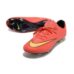 Botas de fútbol Nike Air Zoom Mercurial Vapor 10 Elite rojas y amarillas para terreno firme (FG).