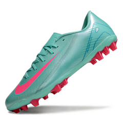 Botas de fútbol Nike Zoom Mercurial Vapor 16 Academy Azul claro y rosa para césped artificial AG
