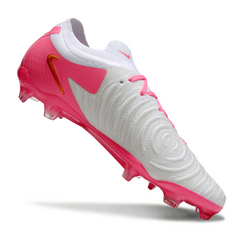 Scarpa da calcio Nike Phantom GX2 Elite bianca e rosa per terreni compatti FG