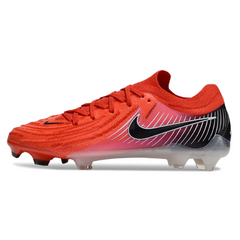 Botas de fútbol Nike Phantom GX2 Elite rojas y negras para terreno firme (FG).