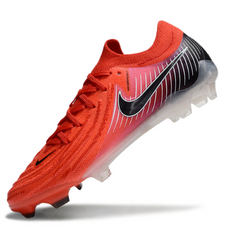 Botas de fútbol Nike Phantom GX2 Elite rojas y negras para terreno firme (FG).