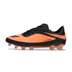 Botas de fútbol Nike Phantom Hypervenom Elite naranja y negro para terreno firme (FG).