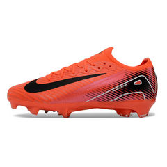 Botas de fútbol Nike Air Zoom Mercurial Vapor 16 Elite rojas y negras para niños, para terreno firme (FG).