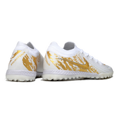 Bota de fútbol Nike Phantom GX2 Elite Turf TF blanca y dorada