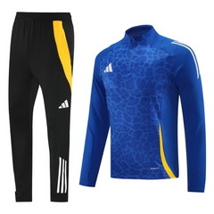 Conjunto Adidas Cold Set azul, amarillo y negro: camiseta y pantalón con cremallera de un cuarto.