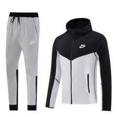 Conjunto Nike Cold negro y gris: abrigo y pantalón