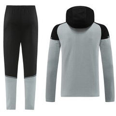 Conjunto de chaqueta y pantalón Puma Cold Set en gris y negro
