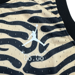 Camiseta sin mangas a rayas amarillas y negras de Jordan